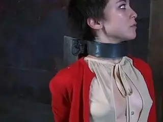Chained young lady feels the pain from mistress BDSM movie