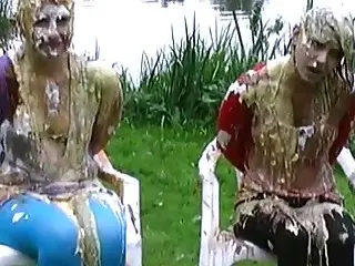 Two nasty girls enjoy BDSM and getting extremely messy outdoor