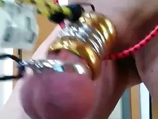 Slave suffers a cock torture as his balls are blue
