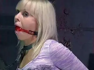 Chained blonde teen's mouth is gagged on a live feed